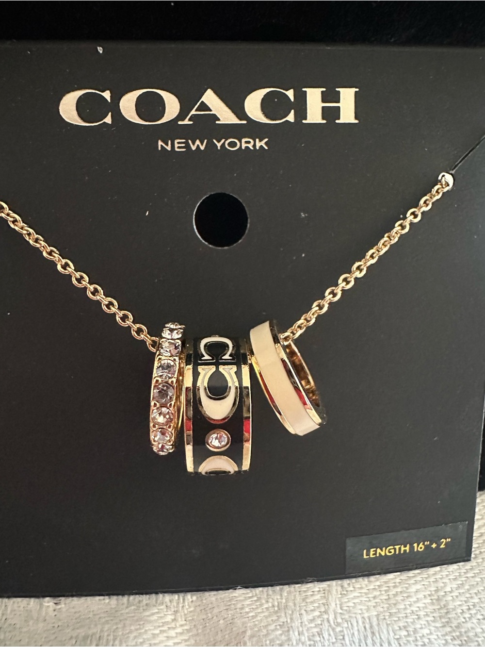 Coach Gold-Tone Ring Pendant Necklace with Crystal Accents